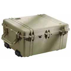 This standard protective transport case from PELICAN features a folding handle, double-throw closure, and four wheels for mobility. It is rated IP67 for dust and temporary water immersion protection. The case is supplied without foam, allowing custom padding for sensitive equipment during shipping, storage, or field use.