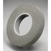 This SCOTCH-BRITE convolute wheel is 10 inches in diameter and 1 inch wide, with a 5-inch arbor. It uses fine silicon carbide abrasive in a hard (9) grade, part of the X2-WL series. Designed for deburring, surface finishing, and edge blending on stainless steel and nickel alloys in industrial metalworking applications