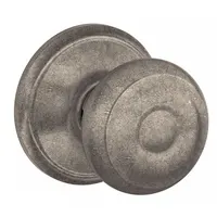 This passage knob lockset is designed for interior doors where locking is not required, such as closets or hallways. It features a nickel finish and Georgian style, suitable for residential or light commercial applications
