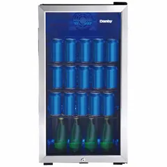This DANBY beverage cooler has a 3.1 cu ft total capacity and features a black finish with a glass swing door. It includes 3 shelves for organizing beverages and operates on 115V AC. Energy Star Certified, it is suitable for storing and chilling drinks in settings such as kitchens, break rooms, or bars.