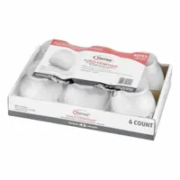 Clear wax votive candle in a clear jar, designed for table lighting applications. Measures 3-1/2 inches in height and 3-5/8 inches in width. Provides ambient illumination for dining surfaces, buffet tables, or decorative displays