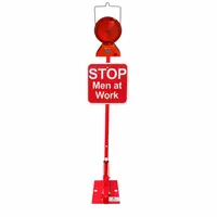 This red, solar-powered Stop Men at Work Railroad Flag Sign with Lights is designed for permanent mounting in railroad work zones. It features a red railroad lamp and operates on solar power, providing a self-contained warning solution to alert personnel and equipment operators of active work areas