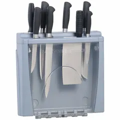 This plastic knife station in gray holds knives and a sharpener. It is non-magnetic and measures 15 inches wide, 4 inches deep, and 15 inches high. Suitable for organizing cutlery in food preparation areas.