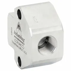 Steam trap connector block for industrial steam systems. Provides a standardized connection interface for steam traps, simplifying installation and maintenance. Used in process heating, HVAC, and other steam-based applications.