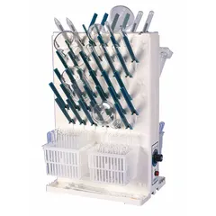Polypropylene benchtop drying rack with four included baskets and 5-inch pegs. Overall dimensions: 16-3/4 in length, 10 in width, 22-3/4 in height. Designed for air-drying laboratory glassware, plasticware, and other washed equipment.