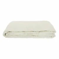 Twin-size quilted bedspread in solid bone color. Made from a cotton/polyester blend with polyester fiberfill. Measures 110 inches long by 81 inches wide. Suitable for hospitality or residential use as a lightweight decorative cover