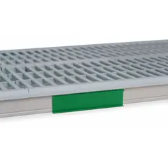Green identification marker designed for MetroMax i Series plastic shelving. Measures 6 inches wide by 1.5 inches tall. Clips onto shelf edges to provide color-coded visual labeling for organizing and identifying stored contents.