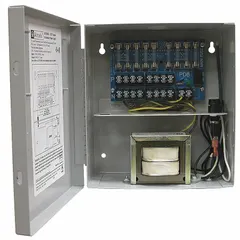 This power supply board with steel enclosure operates on 115V AC input and delivers 24 VAC at 3.5 A through 8 fuses. It provides distributed power for industrial control systems, security panels, and access control equipment in commercial and industrial facilities.