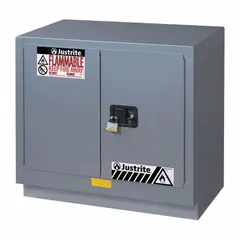 This stationary steel cabinet is designed for the safe storage of flammable liquids. It features self-closing doors and is compatible with counters. Typical applications include use in laboratories, industrial facilities, and workshops for organizing hazardous materials.