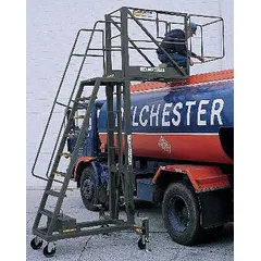 This steel cantilever ladder provides a 13.7 ft platform height for industrial access tasks such as maintenance and material handling. The unassembled unit features locking casters for mobility and stability, with serrated surfaces for slip resistance. Gray finish. Suitable for use in factories, warehouses, and plants.