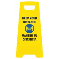 Yellow polypropylene folding floor sign with nominal size 24 in x 12 in. Displays bilingual message 'Keep Your Distance - 6 ft. - Manten Tu Distancia' to indicate spacing guidelines. Not retroreflective. Suitable for use in industrial facilities, warehouses, and public areas to promote social distancing