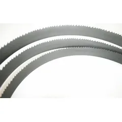 This WESTWARD band saw blade is a bi-metal type designed for cutting aluminum, carbon steel, soft metal, and wood. It measures 8 ft 10-1/2 in in length with a 10/14 variable tooth configuration that helps reduce vibration and improve finish on thin-walled materials. Suitable for general-purpose metal cutting applications.
