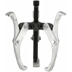 This reversible jaw puller has a 7 ton pulling capacity, 5 in jaw reach, and 0.35 in jaw thickness. It converts between 2-jaw and 3-jaw configurations for removing gears, bearings, and pulleys from shafts in maintenance and repair tasks.