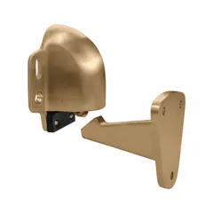Wall-mounted brass catch door holder designed to hold doors open automatically. Suitable for use in industrial and commercial settings where hands-free door positioning is required.