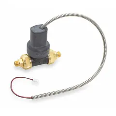Metal solenoid valve for OPTIMA Series electronic faucets. Controls water flow in touch-free commercial restroom applications. Overall length 5 3/4 inches.