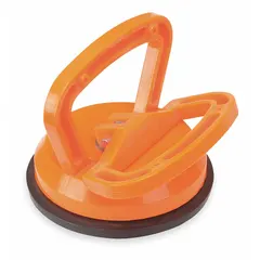 Single-cup rubber lifter for flat surfaces. D-handle design with pull-lever release. Maximum load capacity of 90 lb. Used for lifting and moving flat, non-porous materials such as glass, metal sheets, and plastic panels in material handling tasks.