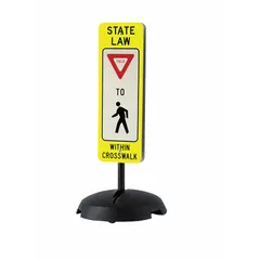 Aluminum regulatory sign with Diamond Grade retroreflective sheeting, meeting MUTCD R1-6 standards. Nominal size 36 in x 12 in. Used to alert drivers to yield to pedestrians within crosswalks on roadways, parking lots, and campus areas.