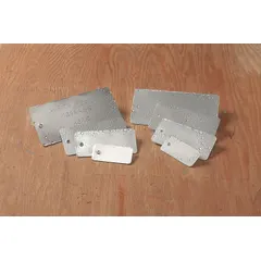 These blank valve tags are made from card stack with aluminum laminated to both sides, providing a writable surface for identification. Suitable for labeling valves, pipes, and equipment in industrial settings. Supplied in a pack of 25 tags in silver finish.