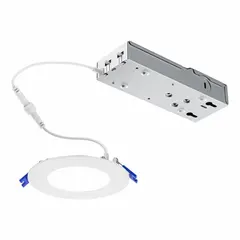 This low-profile canless downlight from LIGHTOLIER is designed for general ambient lighting in commercial and residential spaces. It delivers 900 to 1,100 lumens at 15 W, replacing a 60W incandescent lamp. The fixture operates on 120 to 277V AC, is dimmable, and features a white trim with selectable color temperatures of 2700K, 3000K, 3500K, 4000K, or 5000K.