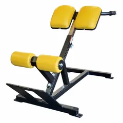 Steel back machine with powder-coated gray and black frame and vinyl padding. Overall length 60 inches. Used for core and lower back strengthening exercises in fitness and rehabilitation settings.