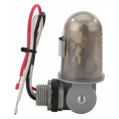 This adjustable stem-mounted photocell features a swivel arm for flexible positioning. It operates on 208-277V AC with SPST switching and includes a gasket for installation. The 1/2-inch stem diameter allows mounting in standard fixtures. Typical applications include automatic dusk-to-dawn lighting control for outdoor areas.