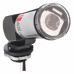Adjustable stem-mounted photocell with swivel arm for automatic lighting control. Features SPST switching, 200-240V AC operation, and 1/2-inch stem diameter. Includes washer gasket for installation. Suitable for dusk-to-dawn control in industrial and commercial facilities.