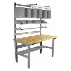 This wood-top packing table features a high-gloss gray finish and adjustable tabletop height from 30 to 36 inches. It includes a corrugated storage shelf with four 12 x 18 inch dividers and a shop light. Suitable for industrial packing and shipping stations, it supports heavy cartons and repetitive tasks.