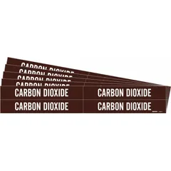 These adhesive pipe markers identify pipes carrying carbon dioxide. The brown background with white legend meets ANSI/ASME A13.1 color standards for hazard identification. Each marker fits pipe outer diameters from 3/4 to 2-3/8 inches. Pack includes 4 markers without directional arrows, sold in a 5-pack quantity.