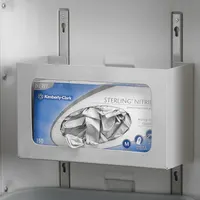 Side-mount accessory for medical carts, constructed of white polymer. Overall dimensions: 6 3/8 in width, 10 1/8 in depth. Designed to hold a glove box for convenient access in healthcare settings