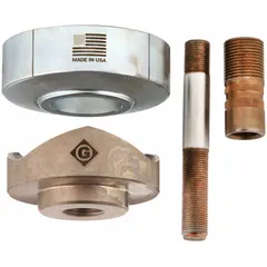 Manual-hydraulic punch and die set for creating holes in 10 ga mild steel sheet metal. Nominal hole size is 4 1/64 in. Used in electrical and mechanical installations such as panel building, conduit entry, and cable tray work.