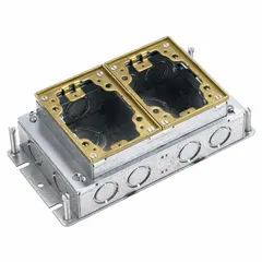 Rectangular steel floor box with 35 cu in capacity and included cover. Accommodates (4) conduit sizes from 3/4 in to 1-1/4 in. Used for in-floor electrical wiring distribution in commercial and industrial buildings, providing a junction point for power and data cables.