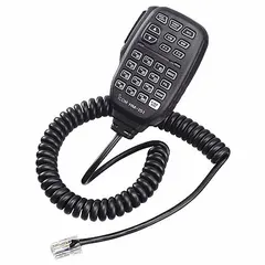 The ICOM HM151 is a speaker microphone designed for use with ICOM 7000 and 7100 series radios. It features a 23-inch cord, a modular connector, and includes a push-to-talk function and a built-in keypad. The unit is black in color and combines a speaker and microphone for convenient two-way radio communication.