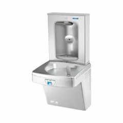 On-wall single drinking fountain with integrated bottle filler. Stainless steel housing with Graystone finish. Chilling capacity of 8 gallons per hour at 50°F. Touchless sensor operation for hygienic use. Top panel access for filter maintenance. Suitable for commercial and institutional settings requiring a wall-mounted water dispenser.