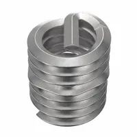 Screw-locking tanged helical insert for repairing or reinforcing threads in metal. Features 5/16"-18 coarse right-hand thread, 18-8 stainless steel construction, and tensile strength of 200,000 to 250,000 psi. Plain finish, supplied in a 500-piece pack. Requires 5/16"-18 STI tap for installation