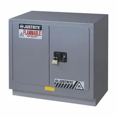 This JUSTRITE flammable cabinet is constructed from steel with a silver finish and features manual doors. It is designed for stationary placement and is compatible with benches. The cabinet provides secure storage for flammable materials in laboratory or industrial environments.