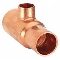 This wrot copper tee connects three copper tubes of different sizes using sweat/solder cup ends. It is used in plumbing, HVAC, and refrigeration systems for joining 1 1/4 in CTS, 1 in CTS, and 1/2 in CTS lines. The cup x cup x cup configuration allows for leak-free joints in potable water or hydronic heating applications