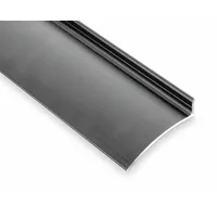 Door drip guard installed at door thresholds to manage water runoff and prevent moisture intrusion. Suitable for weatherproofing and floor protection in commercial and industrial facilities