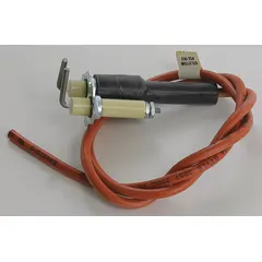 Direct spark igniter for HVACR systems, used to generate a high-voltage spark for lighting gas burners in furnaces and boilers. Suitable for replacement in residential and commercial heating equipment.