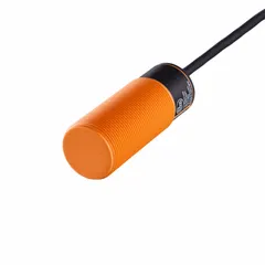 Capacitive cylindrical proximity sensor with 30 mm diameter, non-terminated cable, 3 wires, and PNP output. Operates on 10-36V DC supply voltage. Used for detection of metallic and non-metallic objects such as liquids, plastics, and powders in industrial automation applications including level detection and presence sensing.