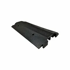 This 2-channel drop-over cable ramp is made of black rubber and features a T-shaped connection style. It supports a load capacity of 4,000 lb per axle. Designed for protecting cables and hoses in high-traffic areas where vehicles and pedestrians cross.
