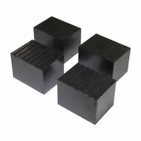 This rubber pad kit includes four pads designed for use with vehicle lifts. Each pad provides a protective, non-slip surface between the lift arms and the vehicle's pinch welds to help prevent damage during service. The kit has a load capacity of 3,000 lb and is compatible with lift models such as the 8000TLX