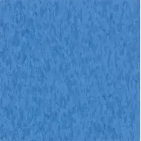 Bodacious Blue vinyl composition tile (VCT) with Imperial Texture finish. Suitable for commercial flooring in high-traffic areas such as schools, hospitals, and retail spaces. Tile width is 12 inches