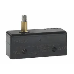 Plunger snap-action switch from the OMRON Z Series with 1NO/1NC contact configuration. Rated for 15 A at 250 V AC. Electrical connection via solder terminals. Used for position sensing, limit switching, and interlock applications in industrial control systems.