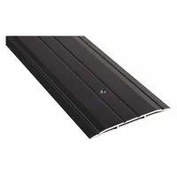 This 4 ft long aluminum saddle threshold features a fluted transition surface. It is used to seal the gap under door openings, reducing drafts, moisture, and debris passage while providing a slip-resistant walking surface for foot and cart traffic