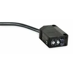 Rectangular photoelectric sensor from the OMRON E3Z series. Features a PBT body, prewired cable with bare-wire electrical connection, and operates on 12-24V DC supply voltage. Suitable for object detection in industrial automation, packaging, material handling, and conveyor systems.
