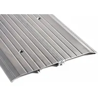 Aluminum saddle threshold for door openings, 3 ft length, with a fluted surface for traction. Used to seal gaps under doors, reducing drafts and pest entry in commercial or industrial settings