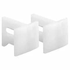 This hanging door guide provides lateral stability and alignment for sliding or bypass door systems. It measures 1 1/8 inches in length and 3 3/4 inches in width, supplied as a single piece. The guide keeps the door properly positioned within the track, preventing sway and ensuring smooth operation.
