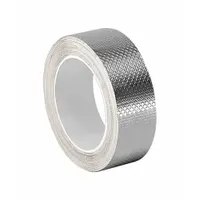 Ultra-conductive embossed foil electrical tape with silver acrylic adhesive. 1 inch width, 6 yard length, 5 mil thickness, rated for 600 volts. Used for electrical grounding, EMI/RFI shielding, and low-resistance connections in electronics and industrial equipment