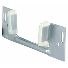 This hanging door guide measures 3 1/4 inches in width. It is used in sliding door systems to maintain alignment and stability of the door panel within the track.