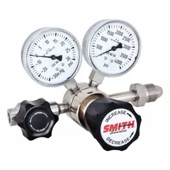 Two-stage regulator for high-purity corrosive gases. Features a stainless steel diaphragm, CGA 660 inlet connection, and 1/8" tube outlet. Maximum outlet pressure 25 psig. Suitable for gas delivery systems requiring precise pressure control.